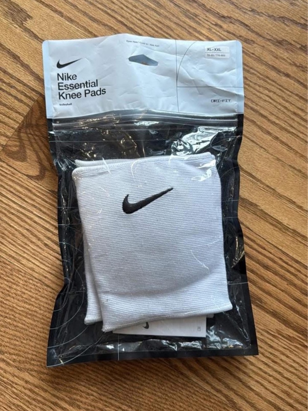 Nike White Knee Pads with Black Swoosh Logo